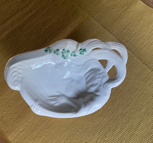 Belleek woman playing harp - playing,